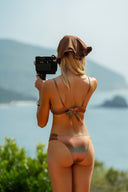 Model wearing the Brigitte gradient earth tones triangle bikini by Sofia Godinho
